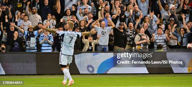 Johnny Russell of Sporting Kansas City celebrates with the fans his first goal of the evening during the first half during a game between Minnesota...