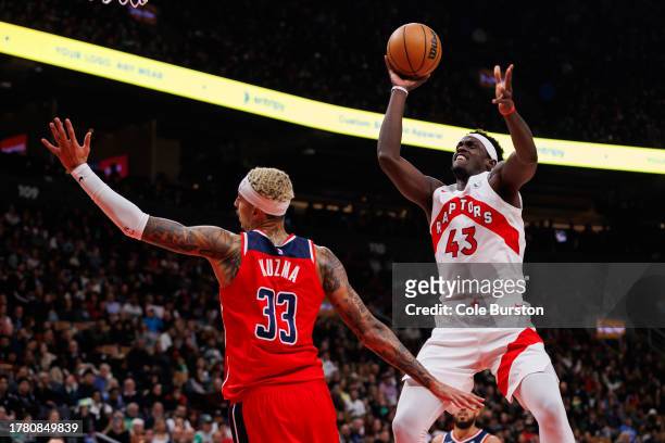 Pascal Siakam of the Toronto Raptors puts up a shot over Kyle Kuzma of the Washington Wizards during the first half of the game at Scotiabank Arena...