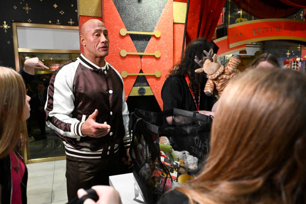 Episode 1874 -- Pictured: Actor Dwayne Johnson during the FAO Schwarz Surprise Giveaway on Monday, November 13, 2023 --