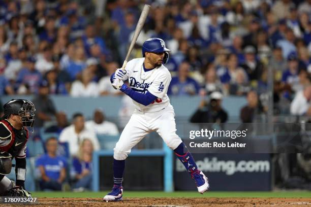 Mookie Betts of the Los Angeles Dodgers bats during Game 2 of the Division Series between the Arizona Diamondbacks and the Los Angeles Dodgers at...