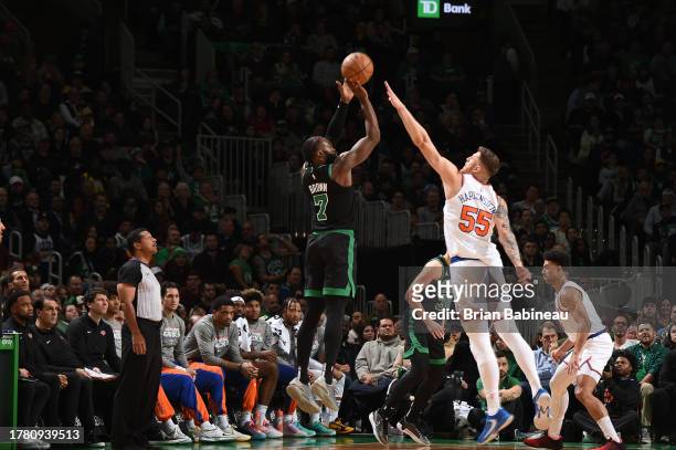 Jaylen Brown of the Boston Celtics shoots a three point basket during the game against the New York Knicks on November 13, 2023 at the TD Garden in...