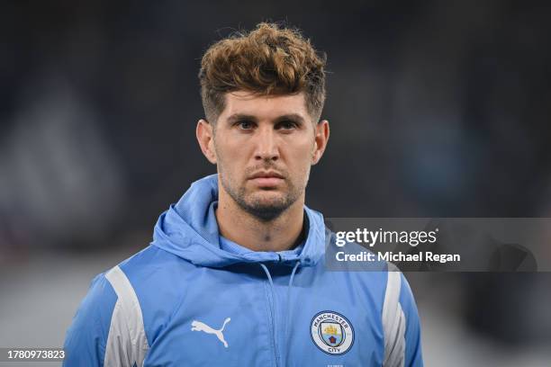 John Stones of Manchester City looks on before the UEFA Champions League match between Manchester City and BSC Young Boys at Etihad Stadium on...