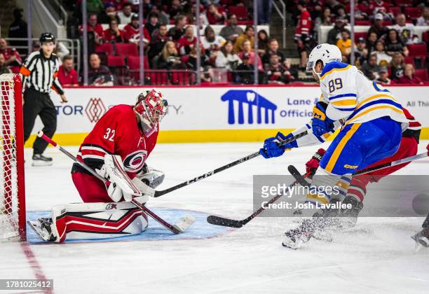 Antti Raanta of the Carolina Hurricanes saves a shot by Alex Tuch of the Buffalo Sabres during the second period at PNC Arena on November 07, 2023 in...