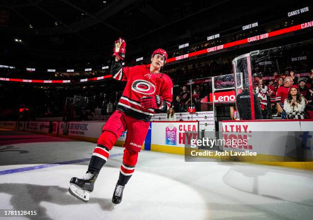 Martin Necas of the Carolina Hurricanes is recognized as one of the stars of the game after the victory against the Buffalo Sabres at PNC Arena on...