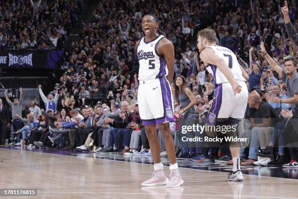 De'Aaron Fox of the Sacramento Kings celebrates during the game against the Cleveland Cavaliers on November 13, 2023 at Golden 1 Center in...