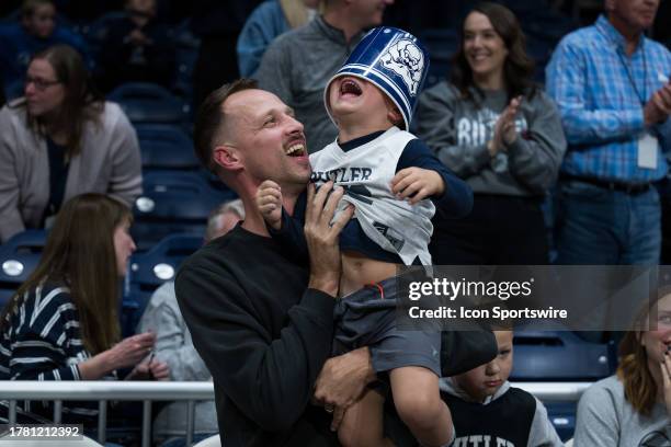 Butler Bulldogs fans cheer int he stands during the men's college basketball game between the Butler Bulldogs and East Tennessee State Buccaneers on...