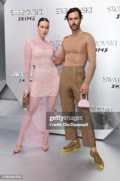 Isabelle Chaput and Nelson Tiberghien attend as Swarovski celebrates SKIMS Collaboration and unveils it's NYC flagship store on November 07, 2023 in...