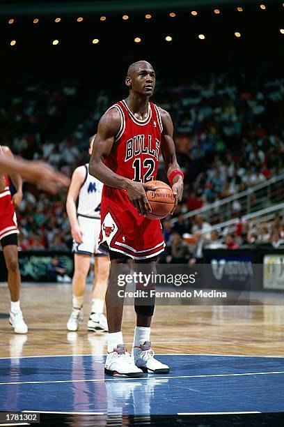 Michael Jordan of the Chicago Bulls shoots a free throw wearing jersey for the only time in his career due to the fact that his jersey was stolen...