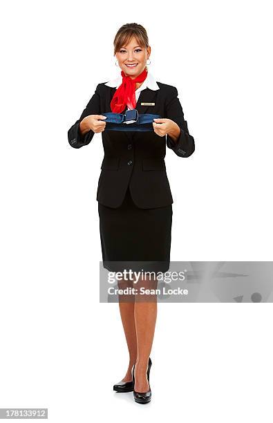 airline: demonstrating how to fasten seatbelt - air stewardess stock pictures, royalty-free photos & images
