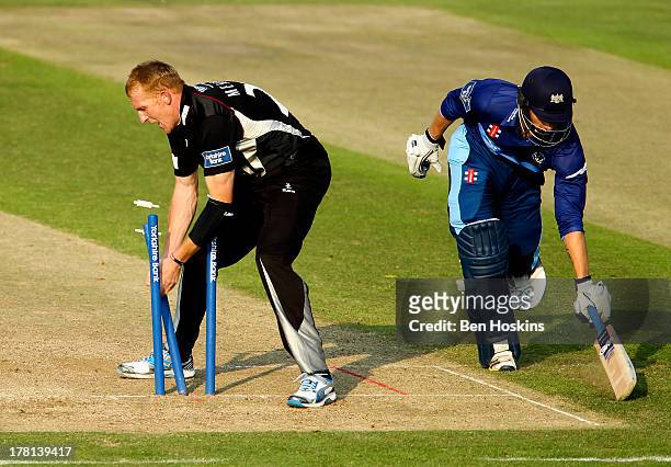 Steve Kirby of Somerset attempts to run out Alex Gidman of Gloucestershire during the Yorkshire Bank 40 match between Gloucestershire and Somerset at...