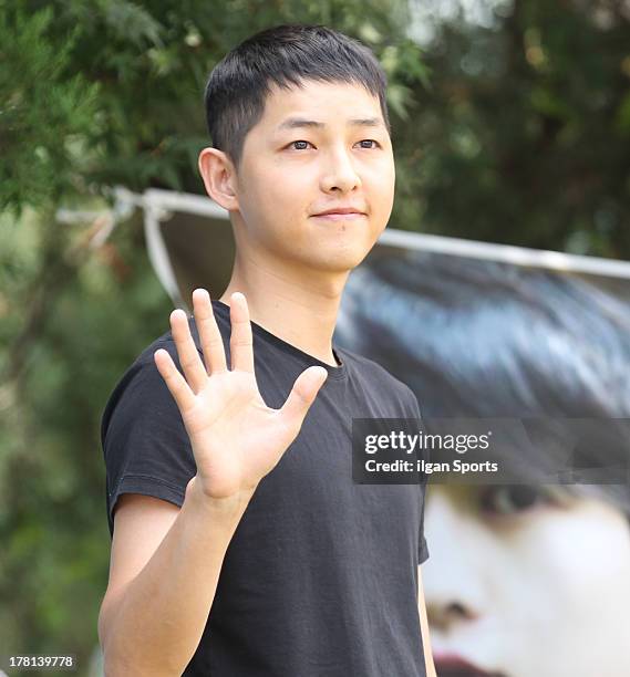 Song Joong-Ki is seen joining the military service at Korea Army Training Center on August 27, 2013 in Chuncheon, South Korea.