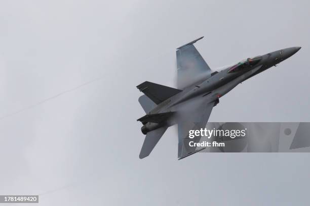 fast fly-by military fighter aircraft - fighter jet engine stock pictures, royalty-free photos & images