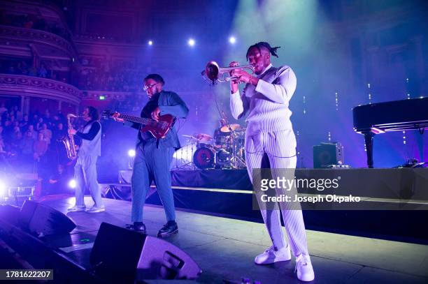 James Mollison, TJ Koleoso and Ife Ogunjobi of The Ezra Collective perform at Royal Albert Hall on November 07, 2023 in London, England.