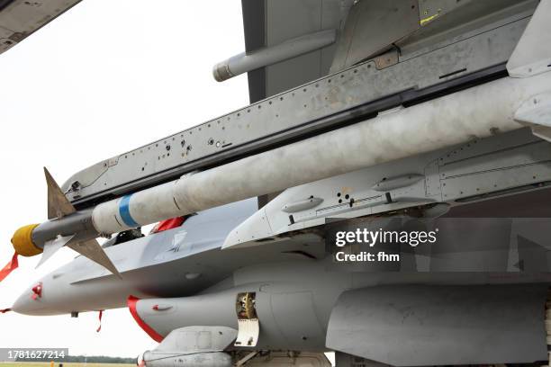 missile on a military fighter aircraft - rocket munition stock pictures, royalty-free photos & images