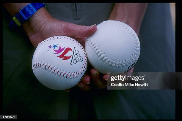 View of two softballs during the USA versus China women''s softball game in the 1996 Olympic Games at Golden Park in Atlanta, Georgia.