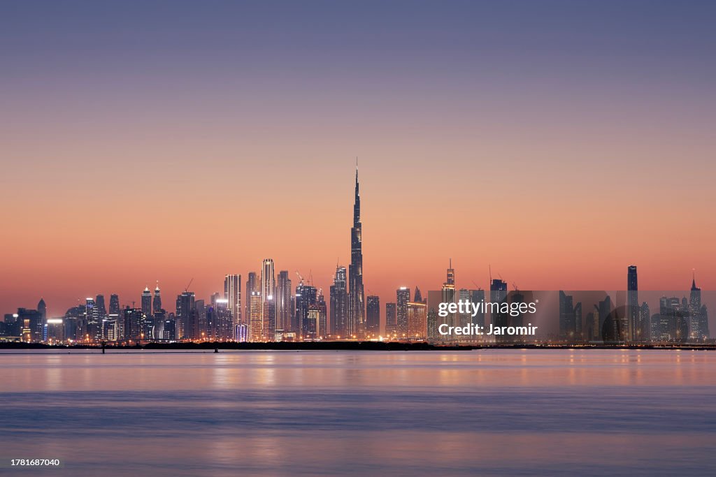 Dubai urban skyline at golden dusk