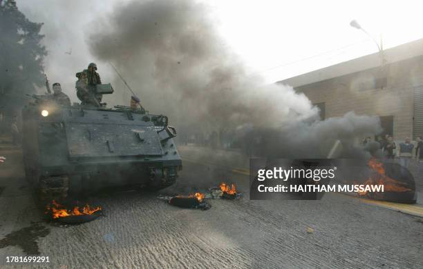 Lebanese troops arrive at the scene of Christian a demonstration in the village of Kahaleh, in the mountains east of Beirut 05 February 2006, where...