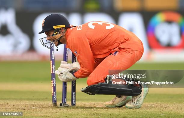 Scott Edwards of Netherlands runs out Dawid Malan of England during the ICC Men's Cricket World Cup India 2023 between England and Netherlands at MCA...