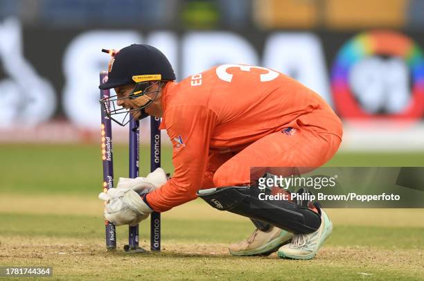 Scott Edwards of Netherlands runs out Dawid Malan of England during the ICC Men's Cricket World Cup India 2023 between England and Netherlands at MCA...