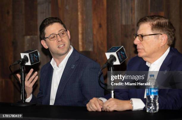 Peter Bendix, new president of baseball operations for the Miami Marlins, left, talks to Bruce Sherman, chairman and principal owner, during the...