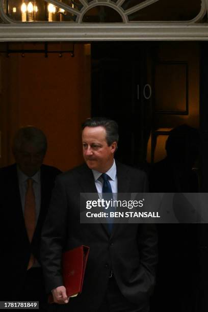 Britain's Foreign Secretary David Cameron leaves 10 Downing Street, in central London, after attending a cabinet meeting, on November 14, 2023...