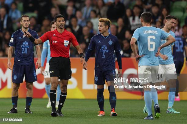 Referee Majed Mohammed Alshamrani is seen talking to players during the AFC Champions League Group H match between Melbourne City and Buriram United...