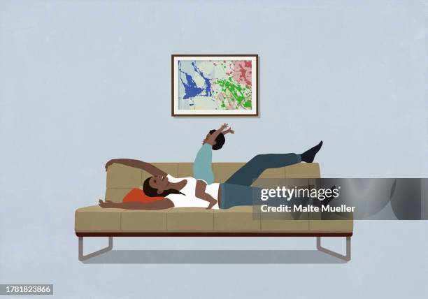 carefree, happy mother and son playing on living room sofa - family house stock illustrations