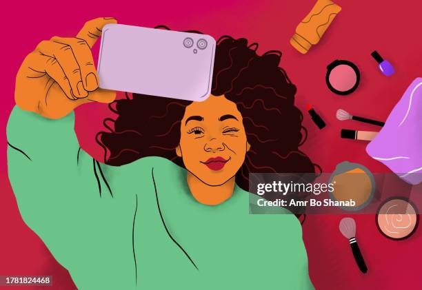 view from above happy young woman taking selfie with smart phone on floor with makeup - self portrait stock illustrations