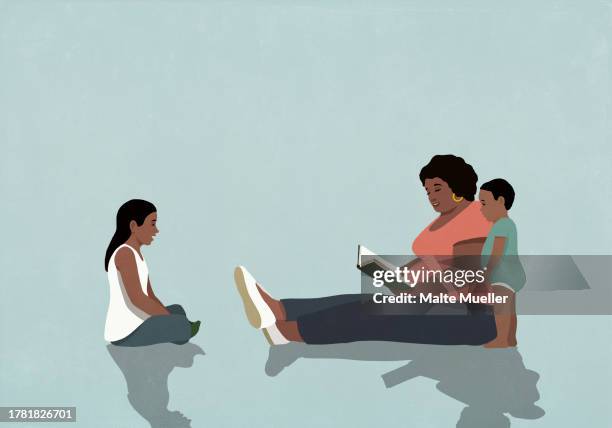 black mother sitting and reading book to daughter and baby son - sisters stock illustrations