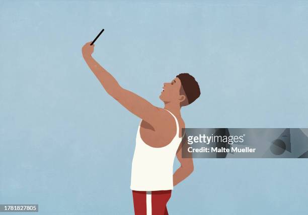 young man taking selfie with camera phone on blue background - arms up stock illustrations