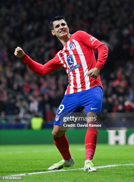 Alvaro Morata of Atletico Madrid celebrates after scoring the team's fifth goal during the UEFA Champions League match between Atletico Madrid and...