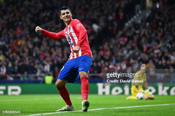 Alvaro Morata of Atletico Madrid celebrates after scoring the team's fifth goal during the UEFA Champions League match between Atletico Madrid and...