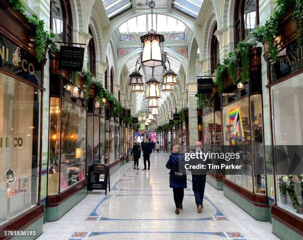shoppers in an arcade - royal arcade stock pictures, royalty-free photos & images