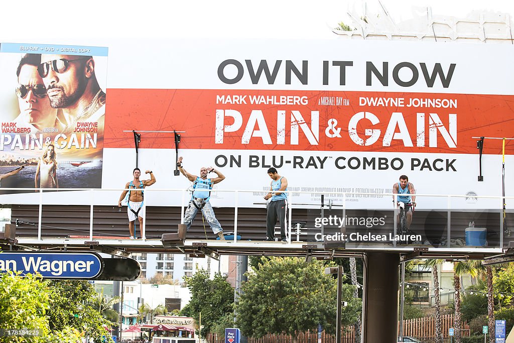 Live Body Builders Get Pumped On A Billboard Over Sunset Boulevard Celebrating The Blu-Ray/DVD Release Of "Pain & Gain"