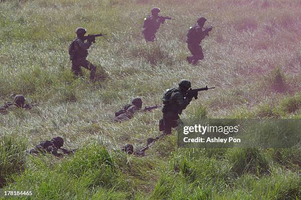 Marine Corps infantry units of the 99th Regiment conducted a urban warfare drill in Kaohsiung's Tsoying Naval Base on August 27, 2013 in Kaohsiung,...