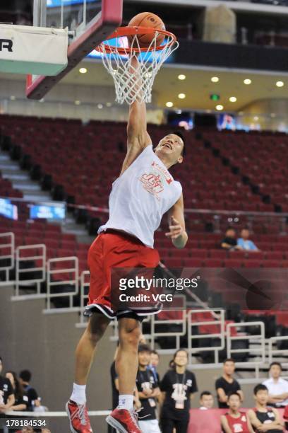 American professional basketball players Jeremy Lin of the Houston Rockets attends a basketball training camp at MasterCard Center on August 27, 2013...