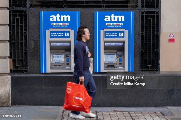 Free ATM cash withdrawal machines on 13th November 2023 in London, United Kingdom. ATM machines aka automated teller machines are where people are...