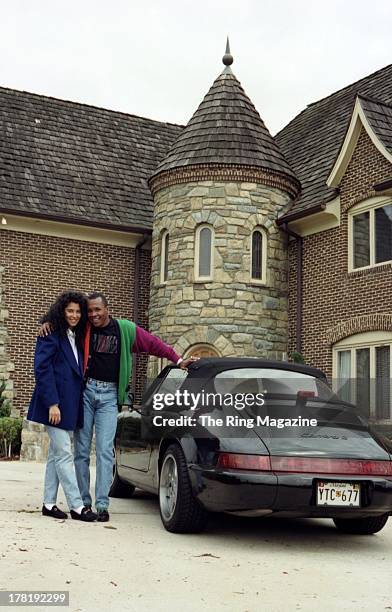 Sugar Ray Leonard and his wife Juanita Wilkinson pose outside their house in Palmer Park, Maryland.