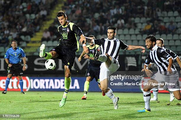 Antonio Galardo of FC Crotone competes the ball with Nico Pulzetti of AC Siena during the Serie B match between AC Siena and FC Crotone at Stadio...