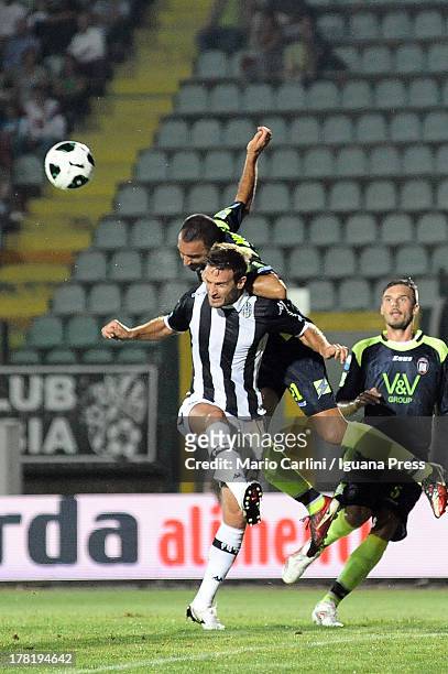 Giuseppe Abruzzese of FC Crotone wins a header over Santiago Morero of AC Siena during the Serie B match between AC Siena and FC Crotone at Stadio...