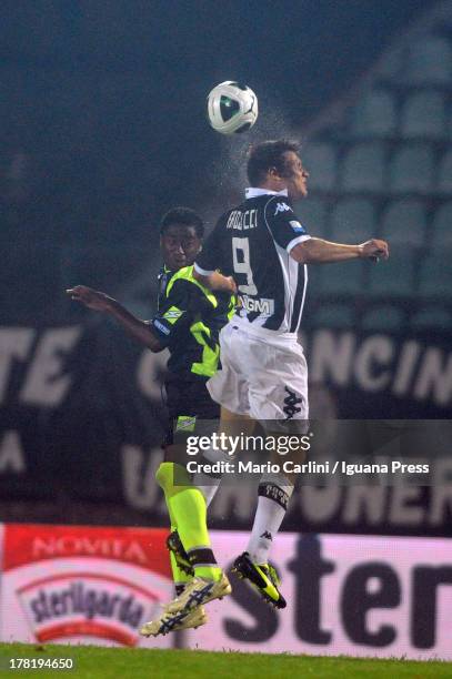 Michele Paolucci of AC Siena wins a header over Kelvin Matute Ewome of FC Crotone during the Serie B match between AC Siena and FC Crotone at Stadio...