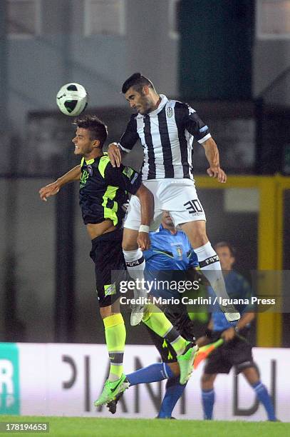 Nico Pulzetti of AC Siena wins a header over Lorenzo Crisetig of FC Crotone during the Serie B match between AC Siena and FC Crotone at Stadio...