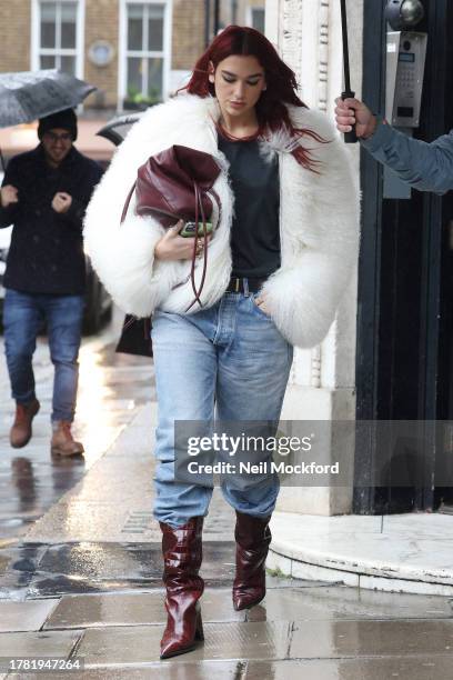 Dua Lipa leaving KISS Radio Studios on November 08, 2023 in London, England.