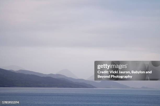 beautiful blue layers at sunrise near the isle of skye, scotland - beyond stock pictures, royalty-free photos & images