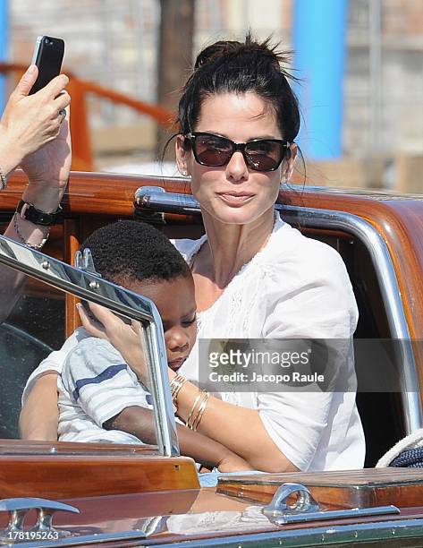 Actress Sandra Bullock and son Louis Bardo Bullock is seen during the 70th Venice International Film Festival on August 27, 2013 in Venice, Italy.