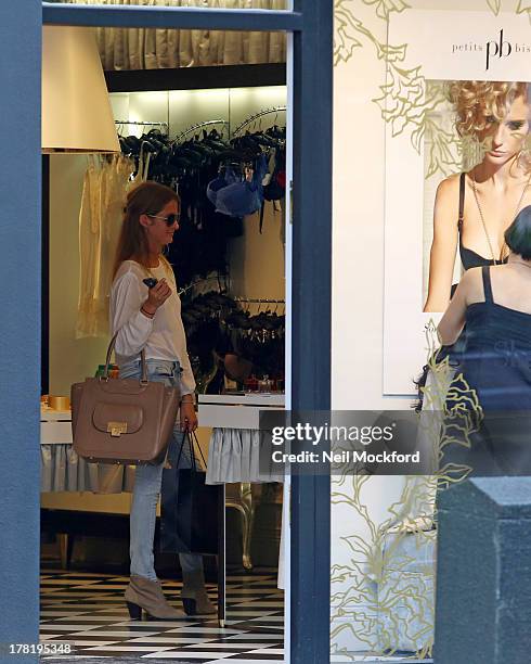 Millie Mackintosh is pictured shopping at Petits Bisous on Kings's Road on August 27, 2013 in London, England.