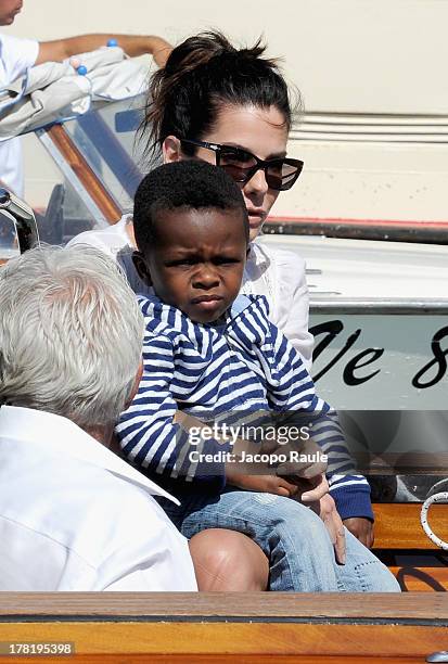 Actress Sandra Bullock and son Louis Bardo Bullock are seen during the 70th Venice International Film Festival on August 27, 2013 in Venice, Italy.