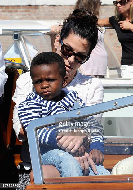 Actress Sandra Bullock and son Louis Bardo Bullock are seen during the 70th Venice International Film Festival on August 27, 2013 in Venice, Italy.