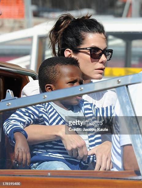 Actress Sandra Bullock and son Louis Bardo Bullock are seen during the 70th Venice International Film Festival on August 27, 2013 in Venice, Italy.