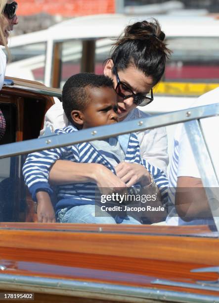 Actress Sandra Bullock and son Louis Bardo Bullock are seen during the 70th Venice International Film Festival on August 27, 2013 in Venice, Italy.